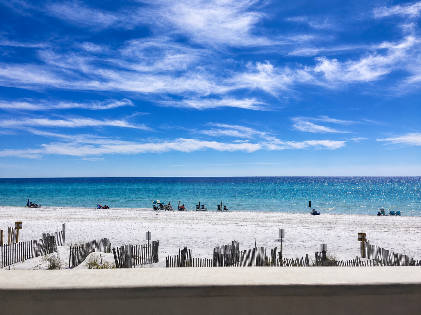 View from the balcony at Leeward Unit 2 — the Gulf of Mexico and white sand beach in Seagrove Beach on 30A