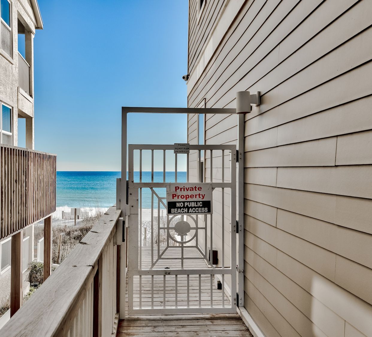Private beach gate at Leeward Unit 2 — direct access to the Gulf of Mexico